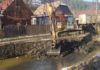 Lucrări de decolmatare a albiei Râului Olt