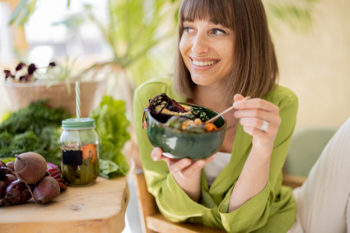relaxed-woman-with-healthy-food-room-with-plants